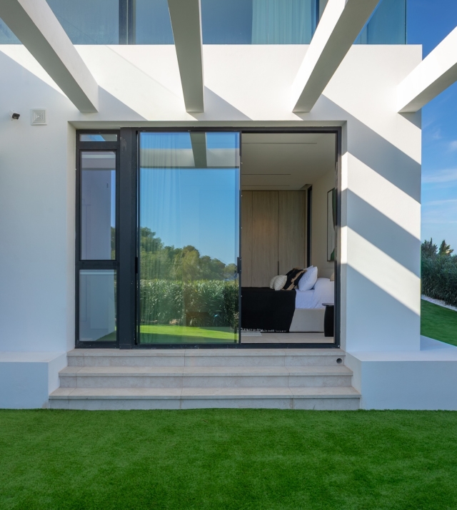 Resa Estates for sale Ibiza Vlla Aixa te koop sale lift sea views exyterior grass.jpg